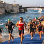 Evento sportivo a Taranto in vista del calendario eventi sportivi 2026- Immagine generata digitalmente a scopo illustrativo.